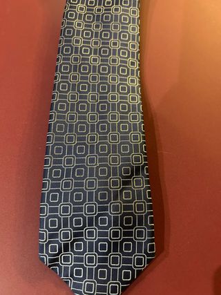 Corbata de exposición azul y dorada