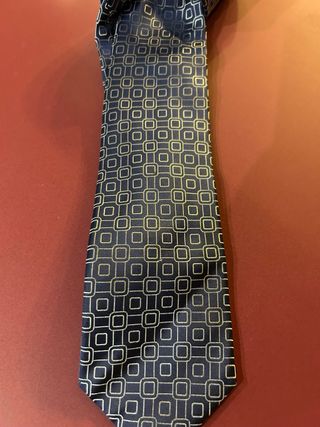 Corbata de exposición azul y dorada