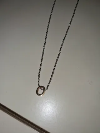 Gargantilla de acero con colganteO
