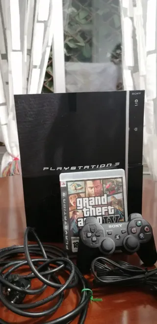PS3 con un Mando y GTA IV