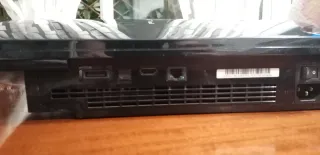 PS3 con un Mando y GTA IV