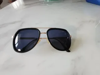 Occhiali da sole uomo Zagato in metallo dorato. 