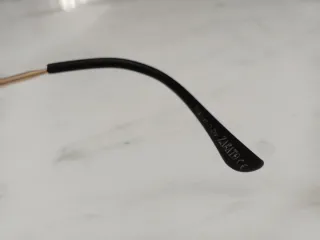 Occhiali da sole uomo Zagato in metallo dorato.