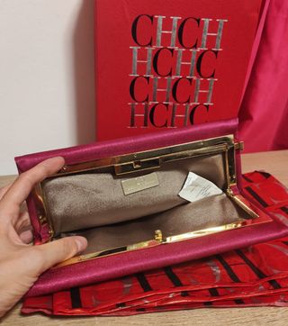 Bolso de mano fucsia . Carolina Herrera 