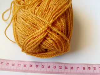 Ovillo lana pelo ocre anaranjado 50g 2 cabos tejer