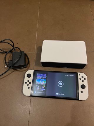 Nintendo Switch OLED Blanca + Mando Pro + 9 Juegos