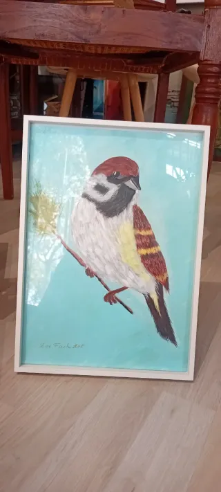 Cuadro de pájaro sobre rama