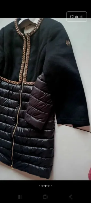 Giubbotto nero con zip dorata