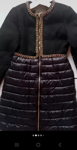 Giubbotto nero con zip dorata