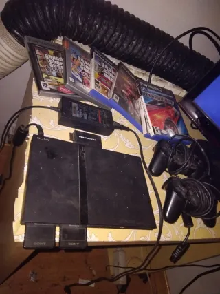 Console PS2 sottile con 2 controller, 2 schede di memoria