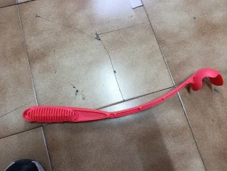 Lanza pelotas para perros.