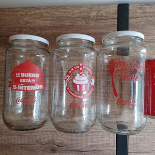 3 bottiglie di Coca-Cola decorate