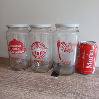 3 bottiglie di Coca-Cola decorate