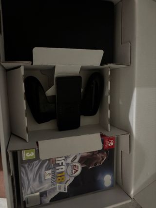 Nintendo Switch con funda, caja y juegos