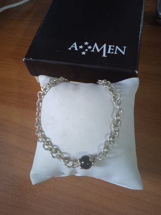 Braccialetto con amuleto