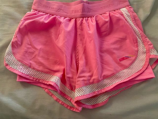 Pantalón corto deportivo rosa décimas