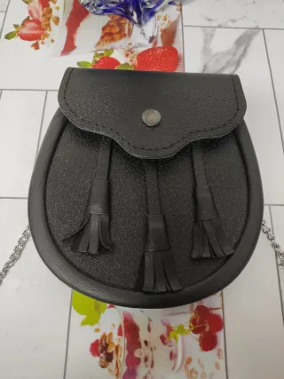 Bolso de cadera negro con flecos