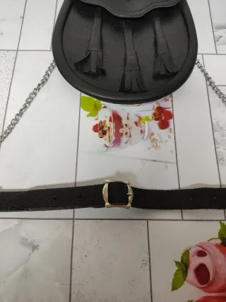 Bolso de cadera negro con flecos