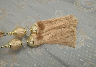 Coppia fermatende beige e oro