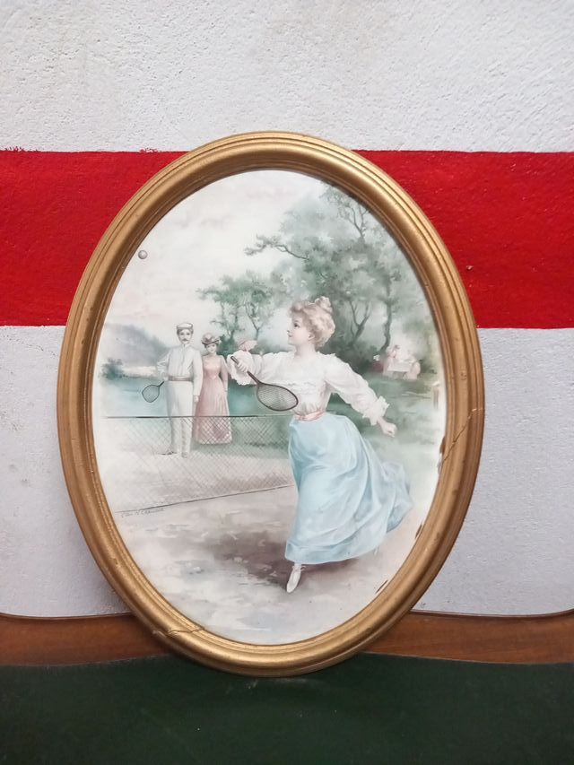 Cuadro ovalado dorado