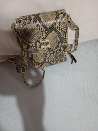 Bolso piel serpiente beige y negro