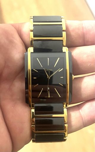 Reloj Rado Negro y Dorado. Precio de lista: 2300 e