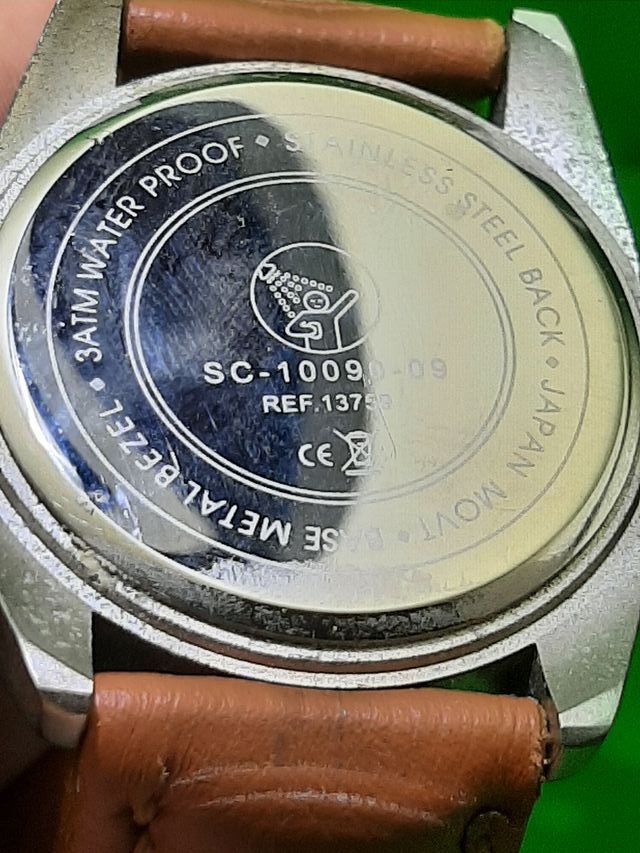 Reloj HH Marrón y Plateado