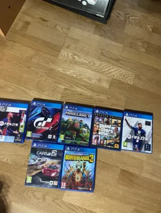 PS4 con 2 mandos y juegos