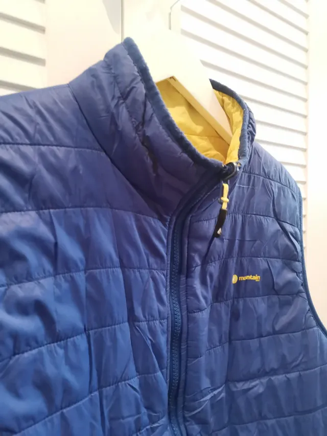 Chaleco Mountain Pro reversible azul y amarillo