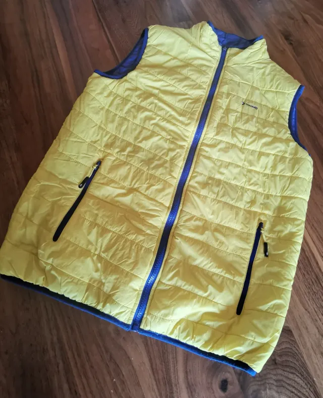 Chaleco Mountain Pro reversible azul y amarillo