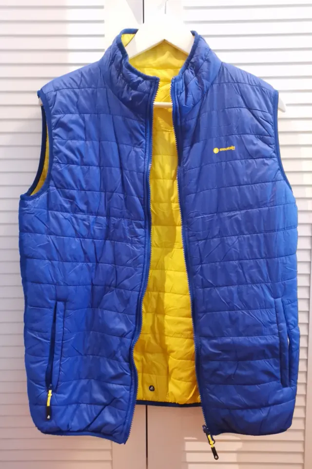 Chaleco Mountain Pro reversible azul y amarillo