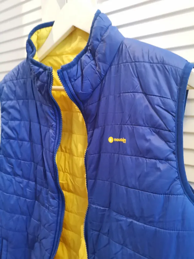 Chaleco Mountain Pro reversible azul y amarillo