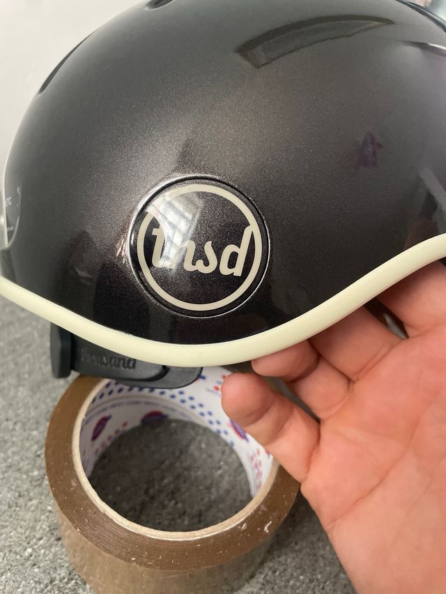 Casco bici Thousand nero con banda bianca