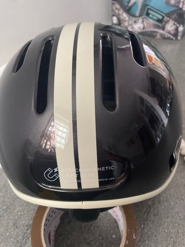 Casco bici Thousand nero con banda bianca