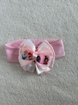 Diadema bebé elástica princesas Disney rosa