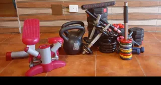 Equipo de pesas y accesorios de gimnasio