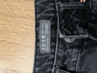 Pantalón vaquero negro desgastado