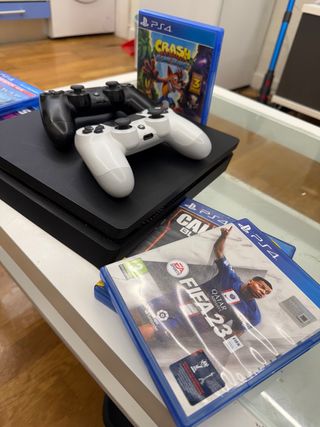 PS4 Slim Negra y Blanca + Juegos
