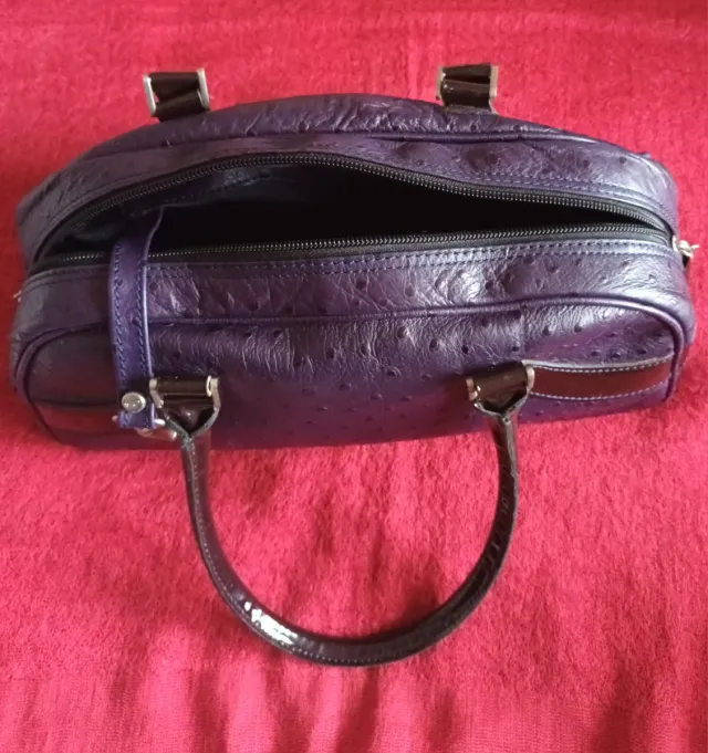 Bolso de piel morado