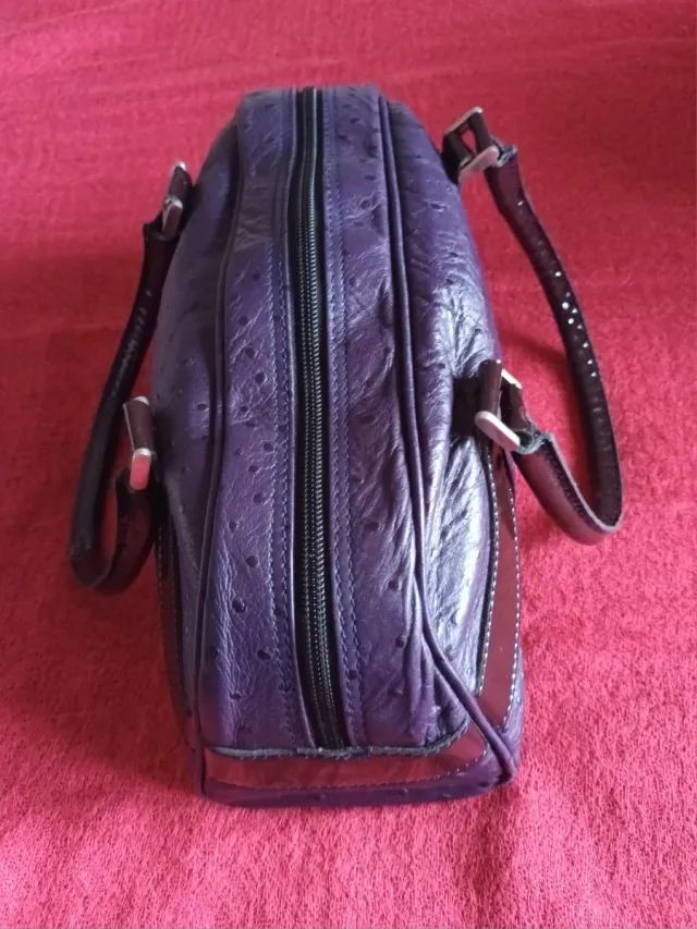 Bolso de piel morado