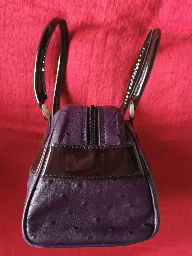 Bolso de piel morado