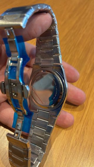 Reloj Tissot PRX Negro y Plateado