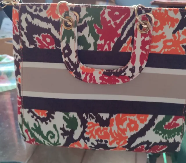 Bolso de mano multicolor con rayas