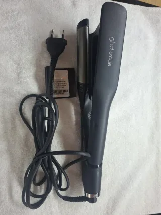 Plancha de pelo ghd color negro y gris
