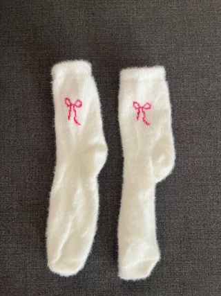 Calcetines blancos con lazo rosa
