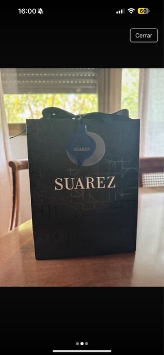 Pendientes Parfois en caja y Bolsa de Suarez 