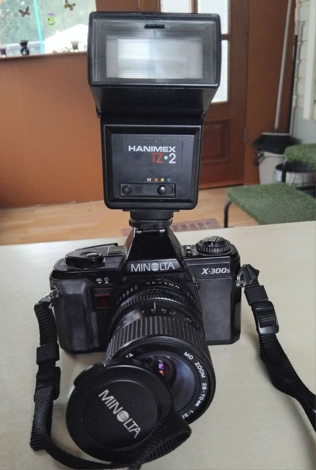 Camara de fotos y de cine las dos 50