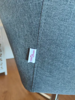 Silla giratoria de tela y metal