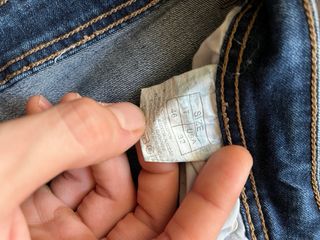Jeans skinny blu con zip