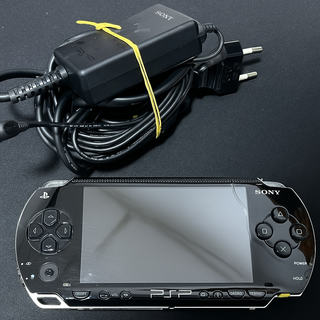 Sony PSP 1004 con Caricatore originale incluso
